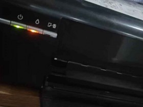 爱普生L801打印机加墨水后一开机墨水灯亮起电脑那里提示检查墨量